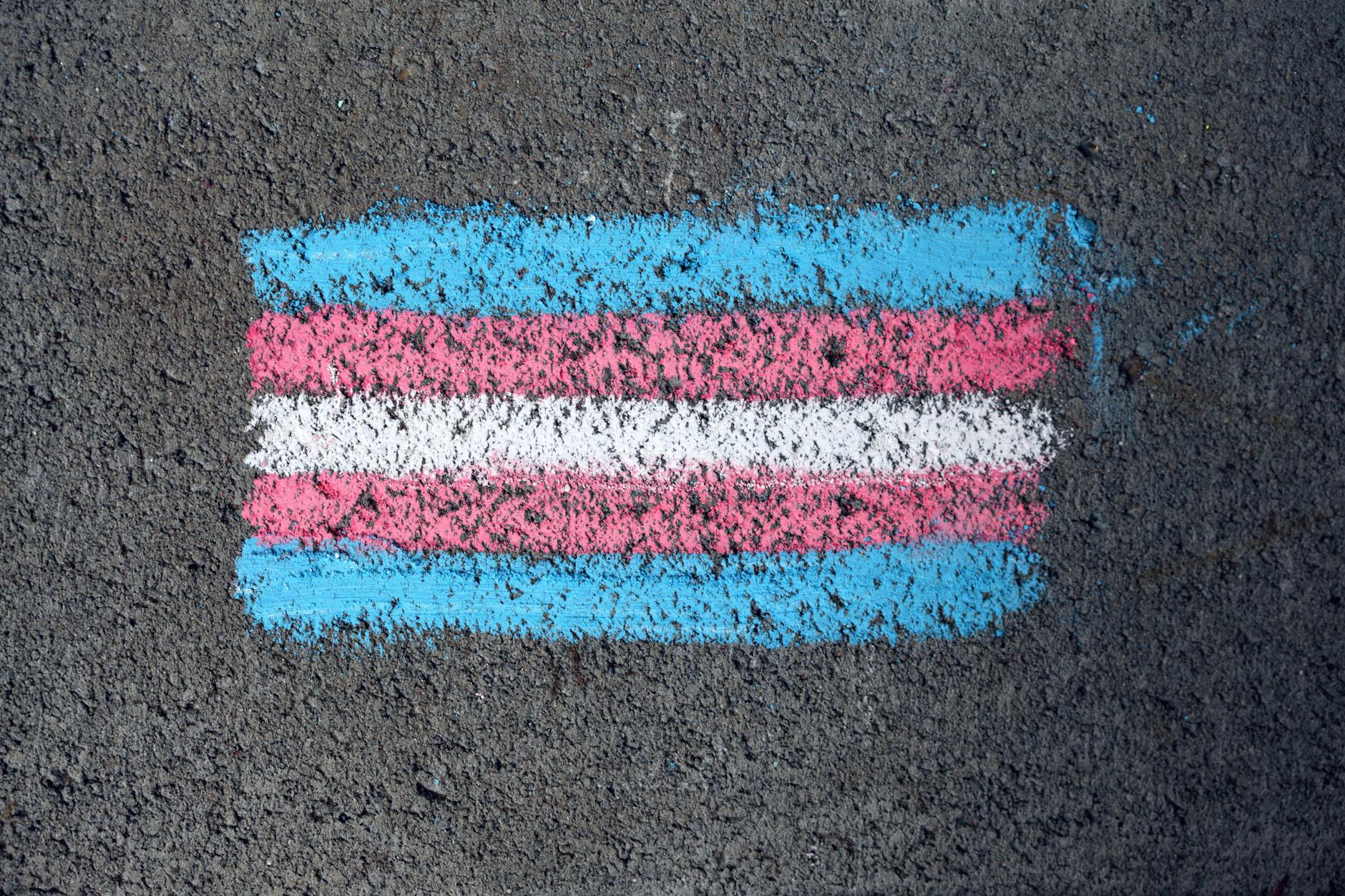 LGBTQIA pride flag drawn on the ground