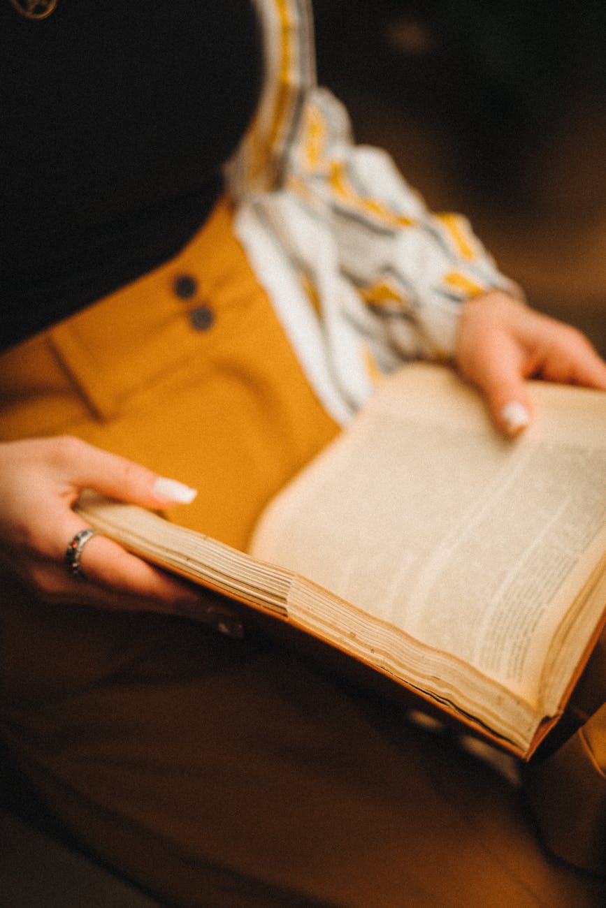 woman reading an old book